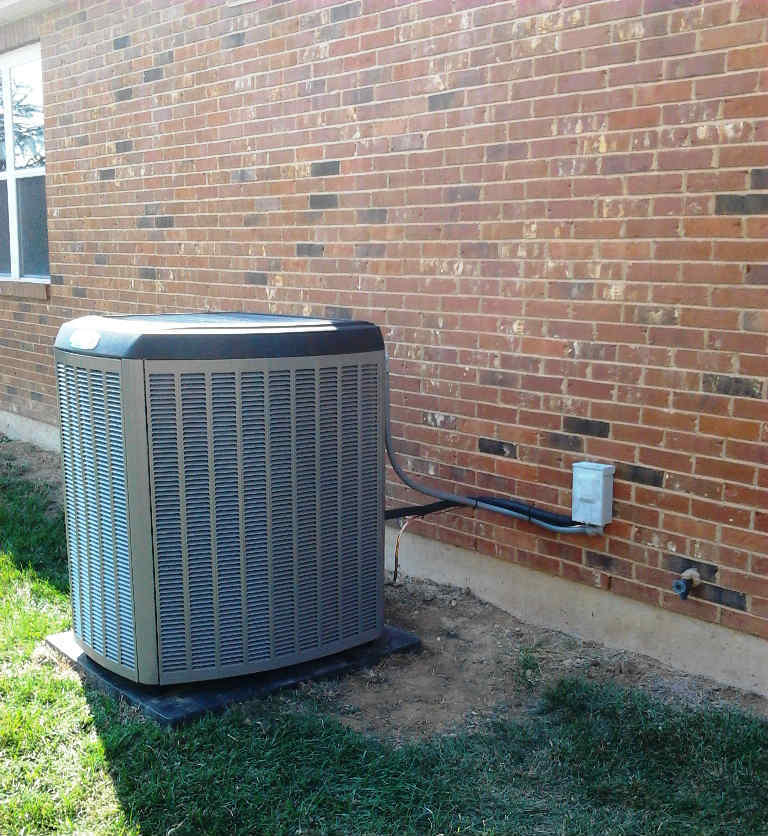 air conditioner on side of house